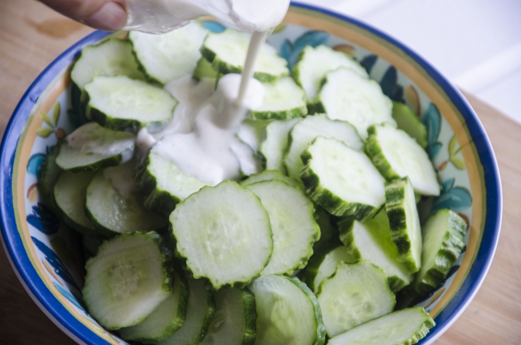 Top cucumbers with creamy yogurt dressing.